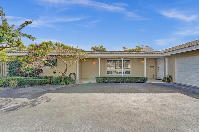 view of front of property featuring a garage