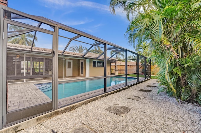 view of pool featuring a lanai