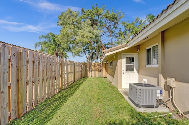 view of yard with central AC