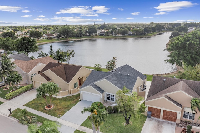 bird's eye view with a water view