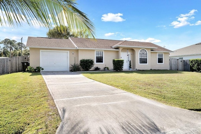 ranch-style home featuring a front yard and a garage