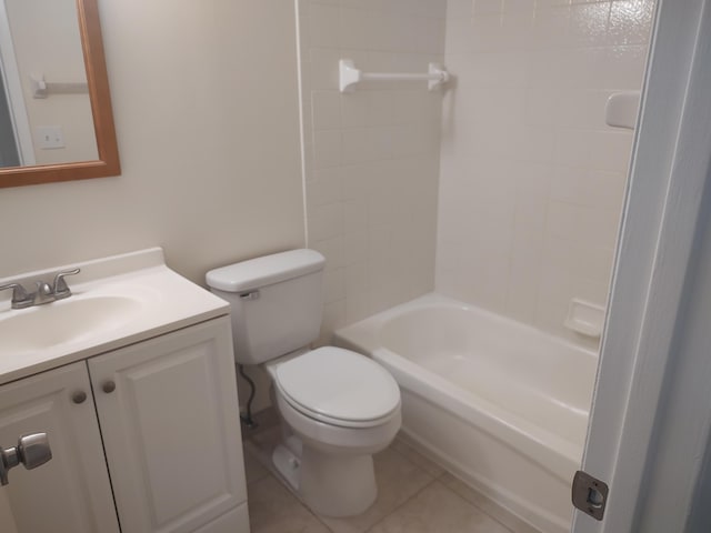 full bathroom featuring tile patterned floors, vanity, toilet, and tiled shower / bath combo