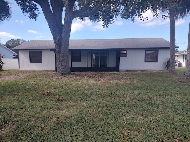 view of front of property with a front lawn