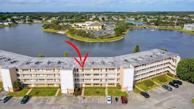 drone / aerial view featuring a water view