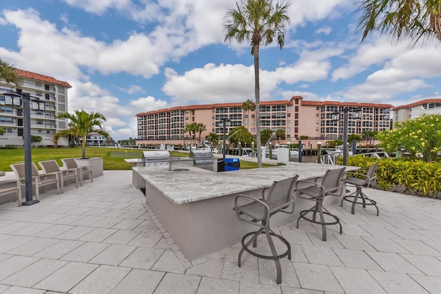 view of patio / terrace with grilling area, area for grilling, and exterior bar