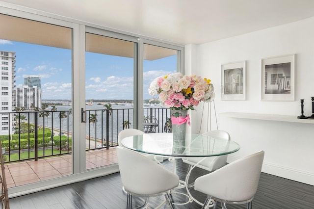 sunroom with a water view