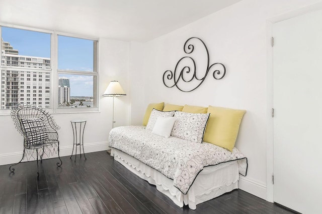 bedroom featuring dark hardwood / wood-style flooring