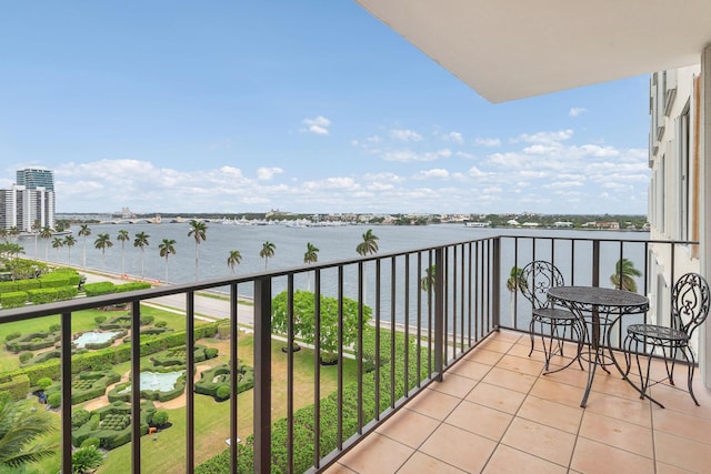 balcony featuring a water view