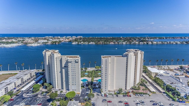 birds eye view of property featuring a water view