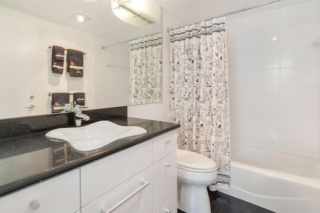 full bathroom with toilet, vanity, and shower / bath combination with curtain