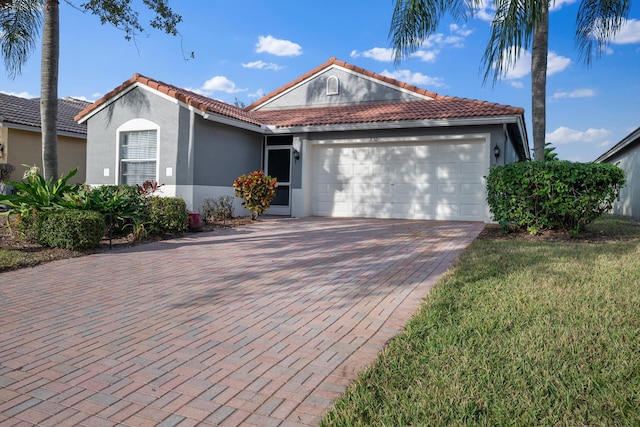 view of front of property with a garage