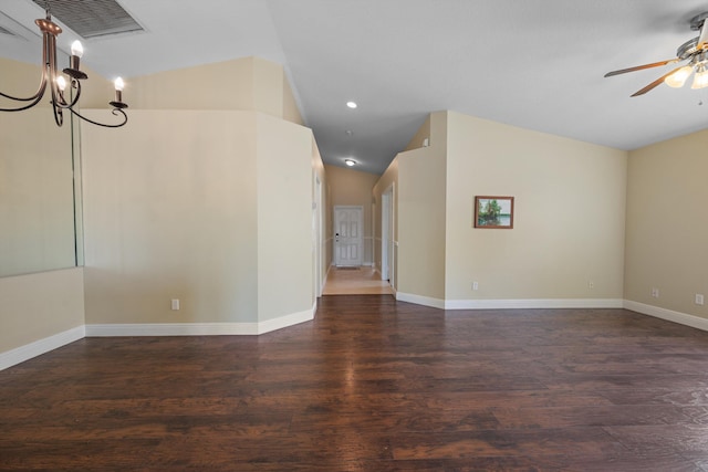 unfurnished room with ceiling fan, dark hardwood / wood-style floors, and lofted ceiling