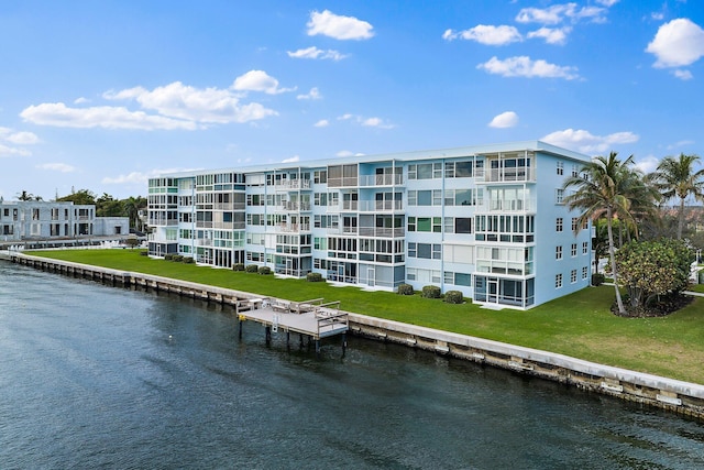 view of building exterior featuring a water view