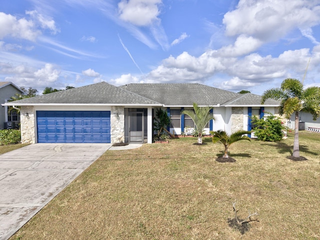 single story home featuring a front yard and a garage