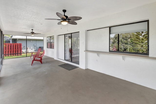 view of patio / terrace featuring ceiling fan