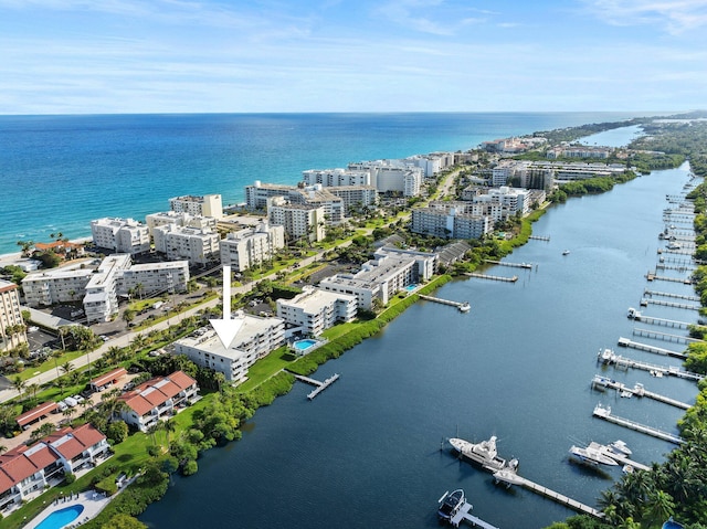 drone / aerial view with a water view