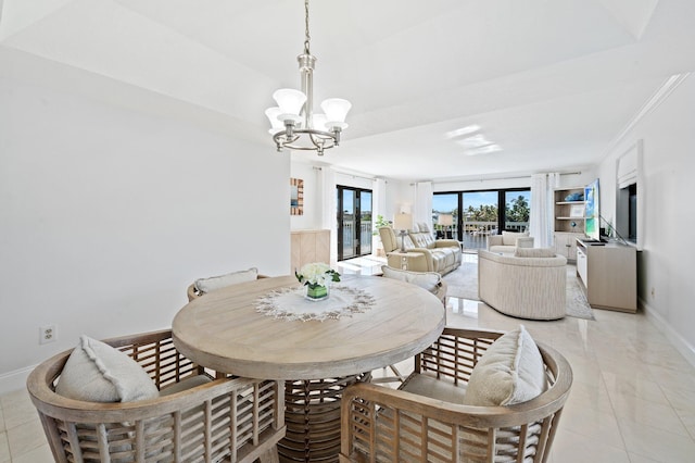 tiled dining area with a notable chandelier