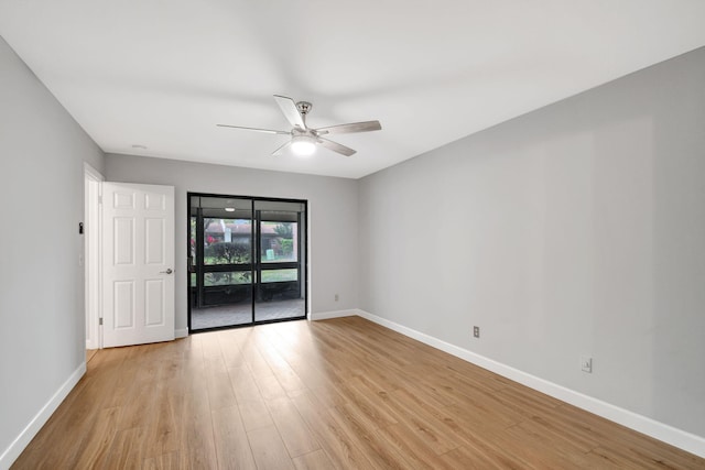 unfurnished room featuring light hardwood / wood-style floors and ceiling fan