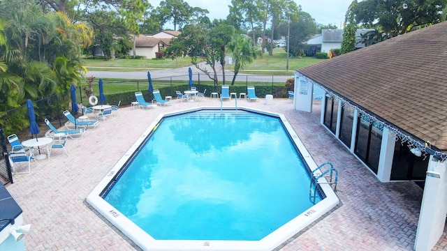 view of pool with a patio area