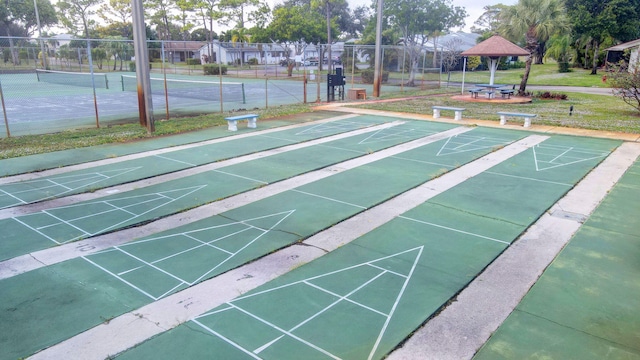 surrounding community featuring a gazebo and tennis court