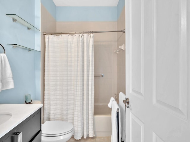 full bathroom featuring tile patterned flooring, vanity, toilet, and shower / bath combo