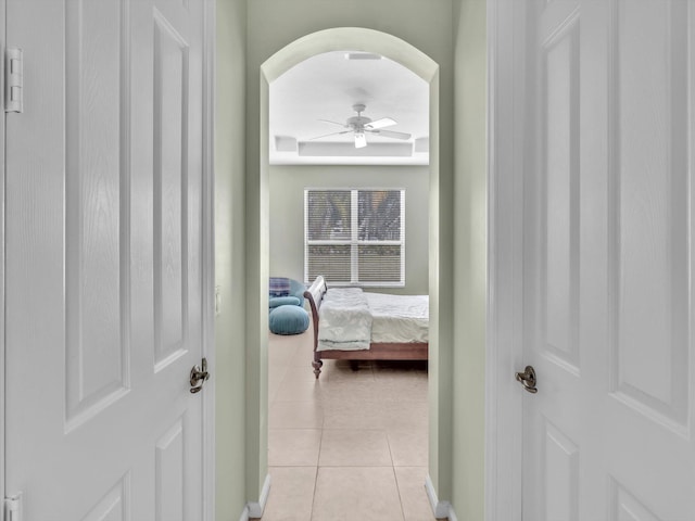 hallway featuring light tile patterned flooring