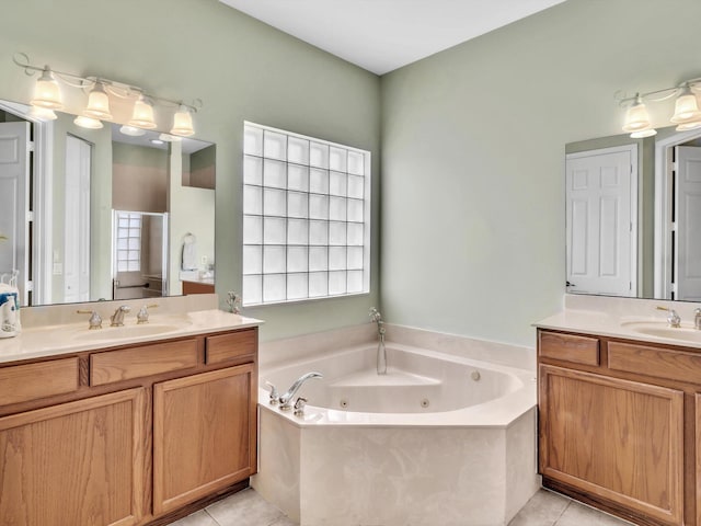 bathroom with tile patterned floors, plus walk in shower, and vanity