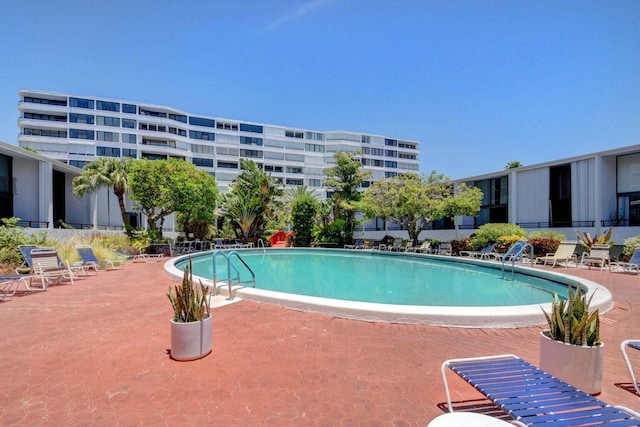 view of swimming pool featuring a patio