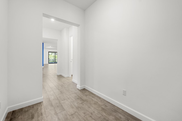 corridor featuring light wood-type flooring