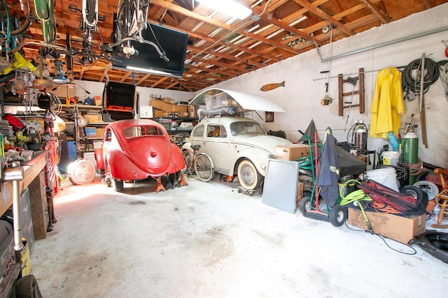 garage with a workshop area