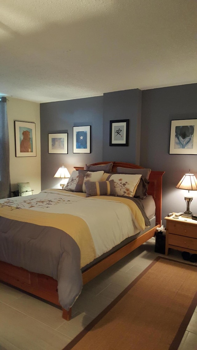 bedroom featuring a textured ceiling