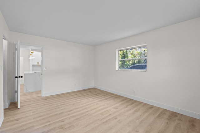 empty room featuring light hardwood / wood-style flooring