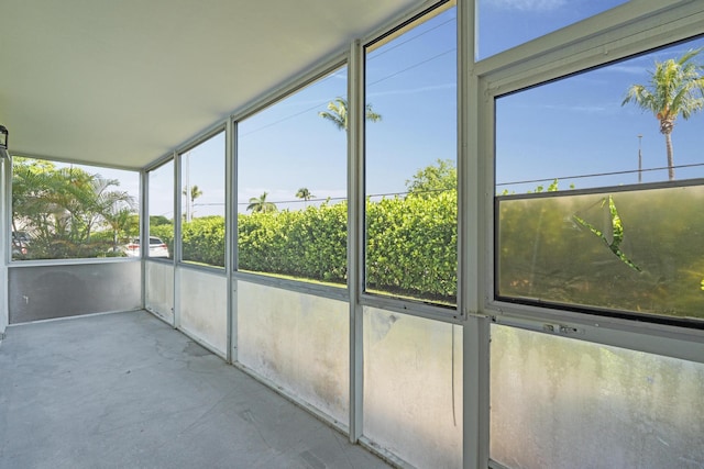 unfurnished sunroom with plenty of natural light