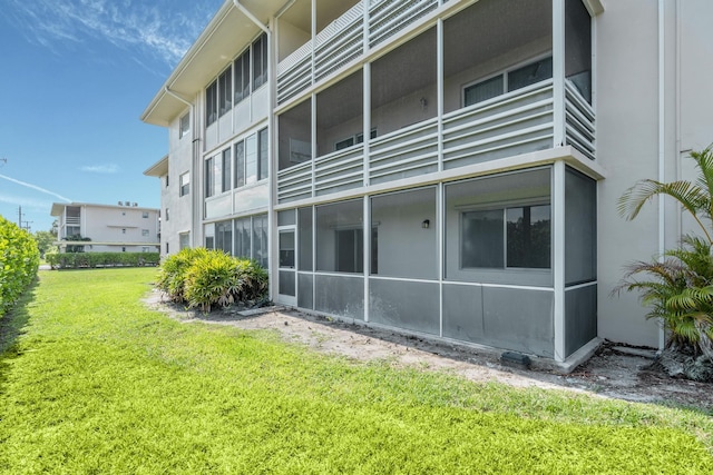 exterior space featuring a yard