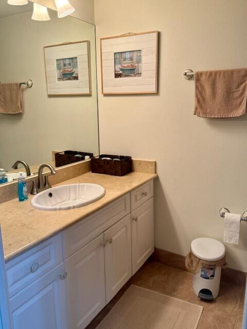 bathroom featuring tile patterned floors and vanity