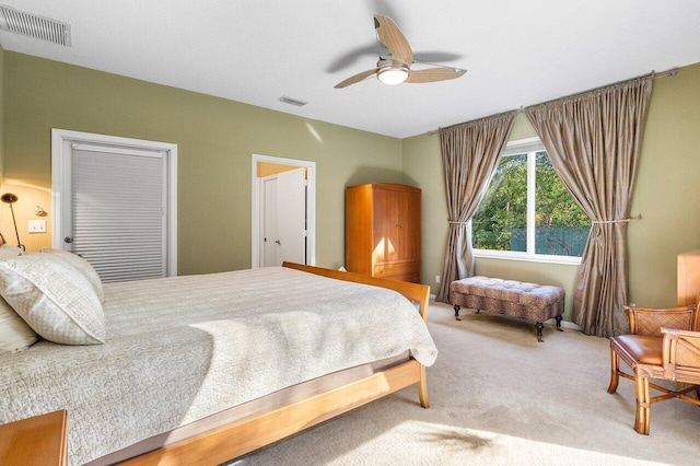 bedroom featuring ceiling fan and carpet floors