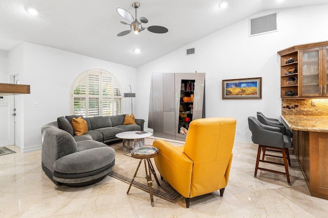 living room featuring ceiling fan, high vaulted ceiling, and a textured ceiling