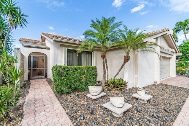 view of front of property featuring a garage