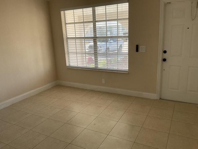 view of tiled spare room