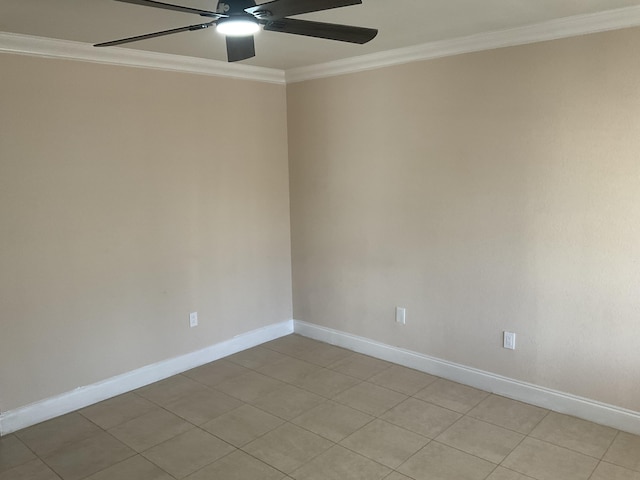 empty room with ceiling fan, light tile patterned flooring, and ornamental molding