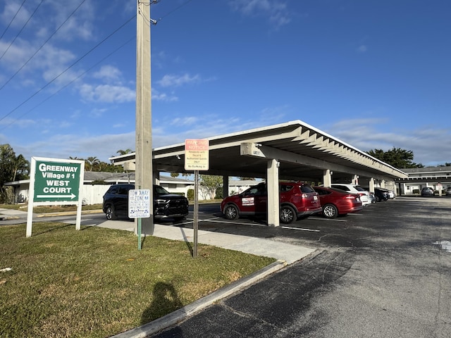 view of car parking featuring a carport