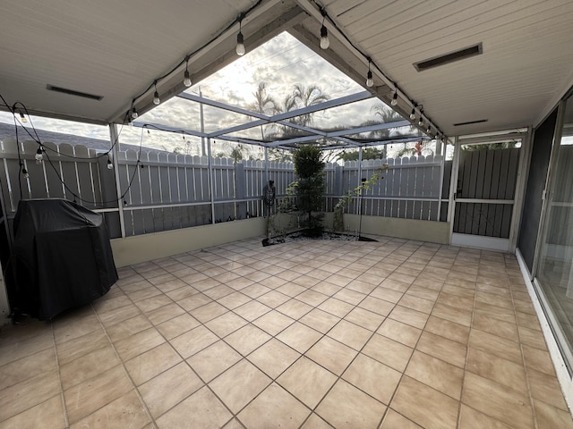 view of patio / terrace with glass enclosure