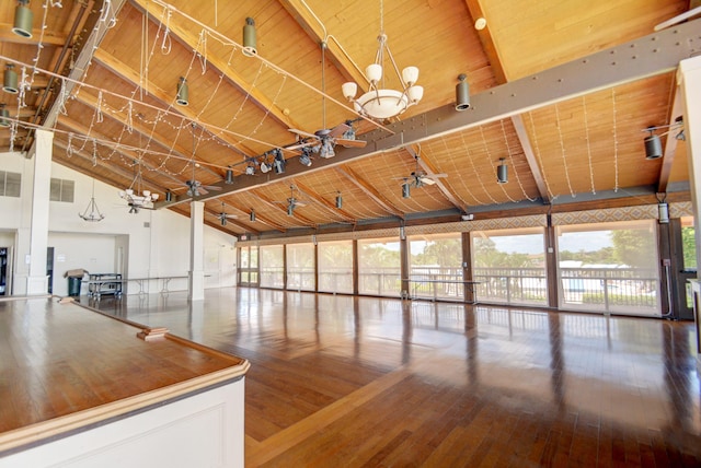 interior space featuring hardwood / wood-style floors, high vaulted ceiling, ceiling fan with notable chandelier, beam ceiling, and wood ceiling