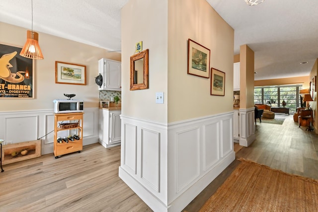 hall featuring light hardwood / wood-style flooring