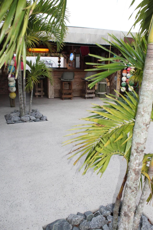 view of patio featuring an outdoor bar