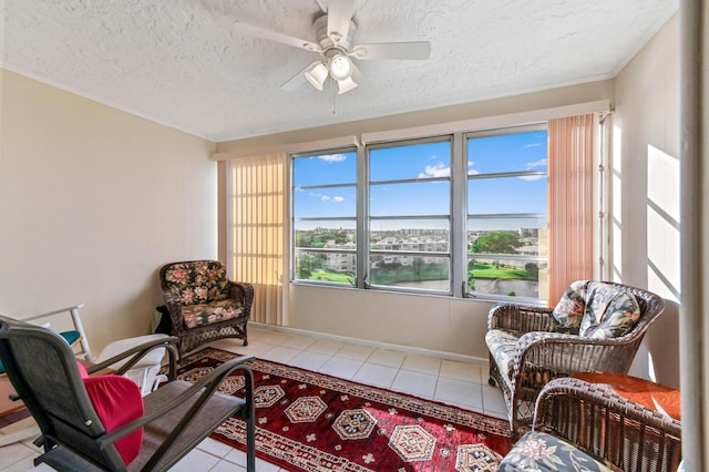 living area featuring plenty of natural light and light tile patterned floors