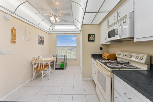 kitchen featuring white cabinets, ceiling fan, white appliances, and light tile patterned floors