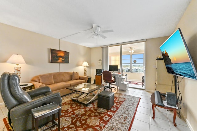 tiled living room featuring ceiling fan