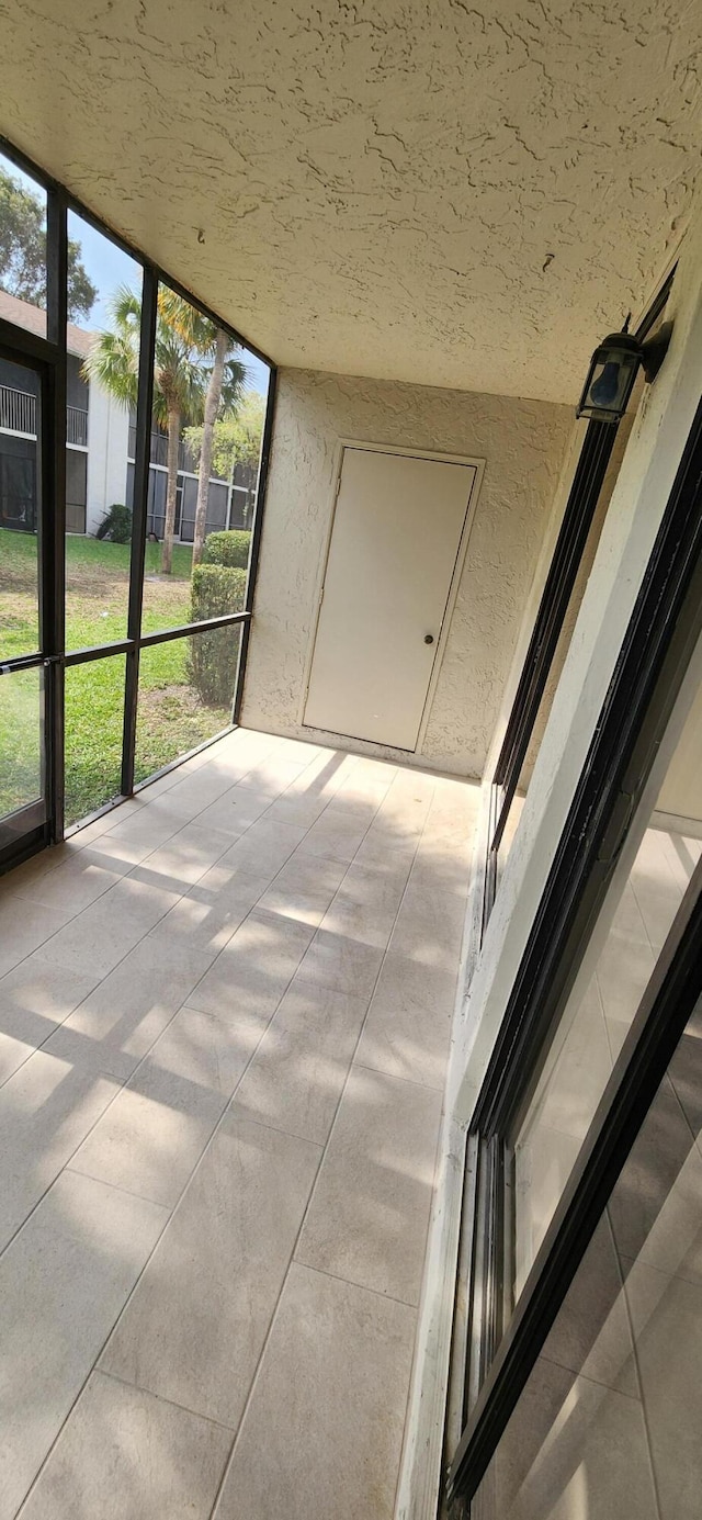 view of unfurnished sunroom