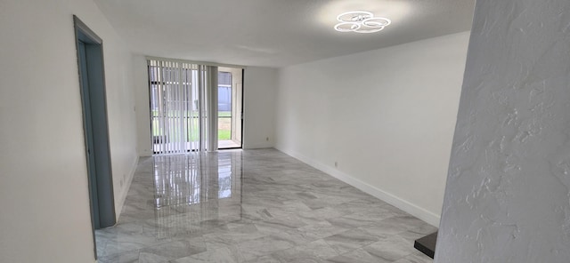 empty room featuring a textured ceiling